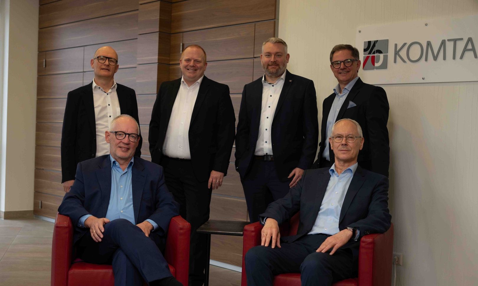 Ein Gruppenfoto des Vorstands von Komtax